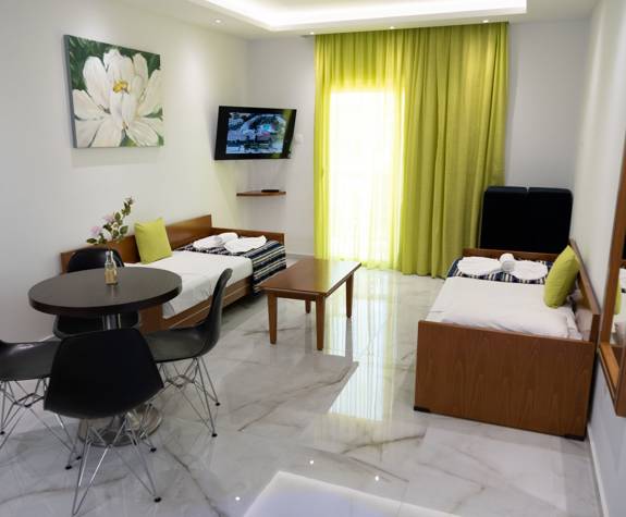 Loutsiana Hotel Deluxe One Bedroom Apt sofas that become beds