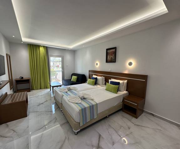 Loutsiana Hotel Deluxe Studio two single beds and sofa